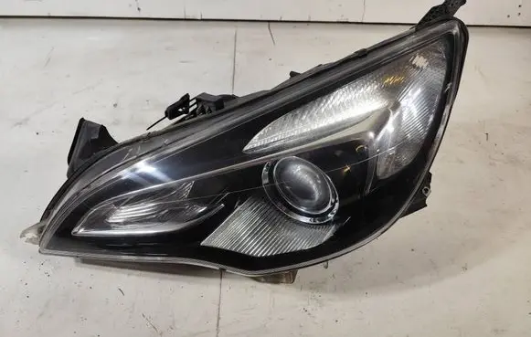 Opel Astra J Headlight/headlamp 13281282 030126260100