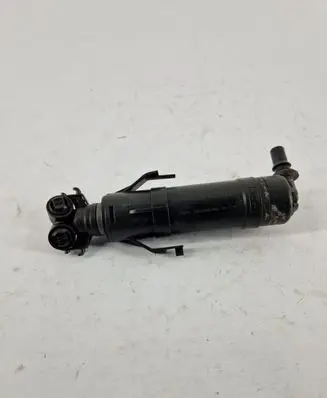 Volkswagen Touran II Headlight washer spray nozzle 1T0955103B