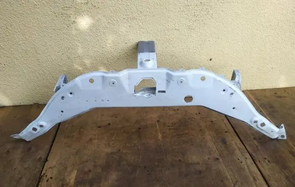 Radiator support slam panel