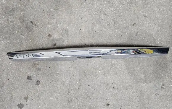 Opel Astra H Trunk door license plate light bar 13266478