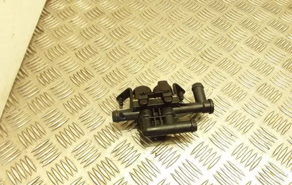Coolant heater control valve