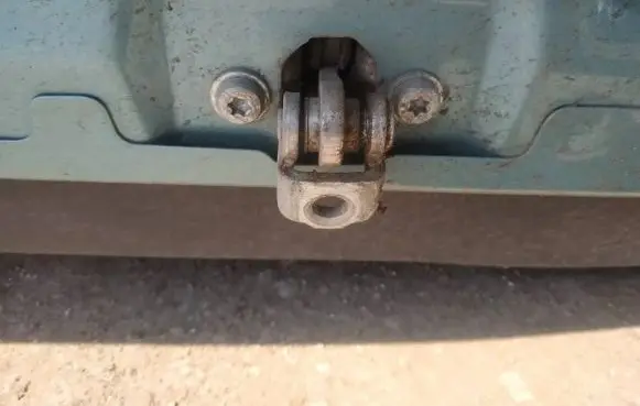 Rear door check strap stopper