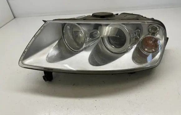 Volkswagen Touareg I Headlight/headlamp 7L6941017BF 89307875