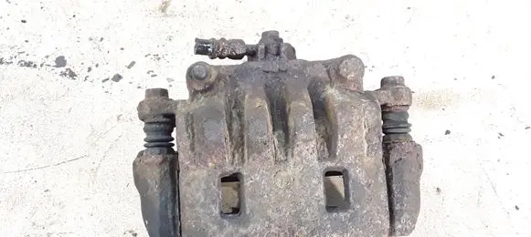 Subaru Impreza III Front brake caliper