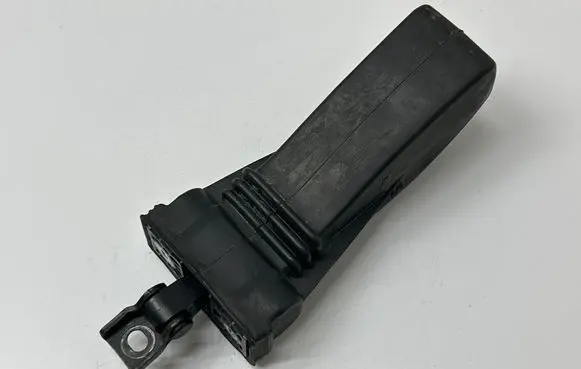Front door check strap stopper