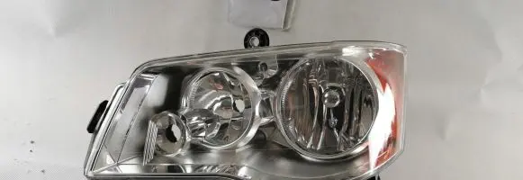 Chrysler Grand Voyager II Headlight/headlamp 05113337AE