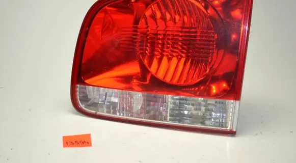 Volkswagen Touareg I Tailgate rear/tail lights 7L6945094H