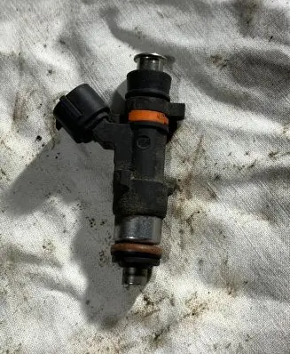 Nissan Micra Fuel injector 16600AX200 0280158013 310706121024
