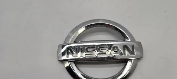 Nissan Micra Manufacturer badge logo/emblem 62890AX600
