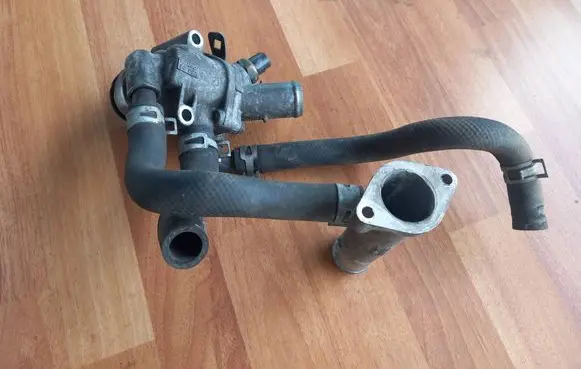 Thermostat/thermostat housing