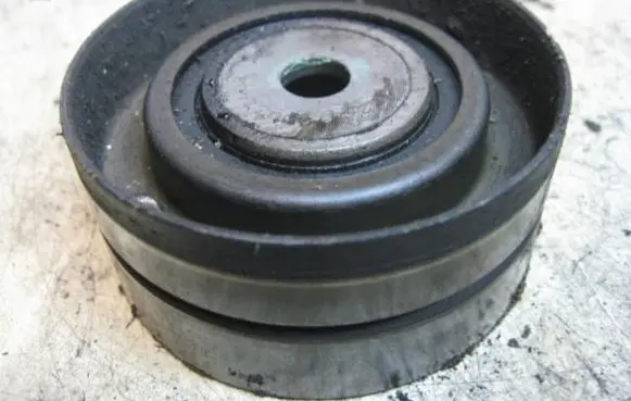 Renault Laguna I Alternator belt tensioner pulley 7700857492