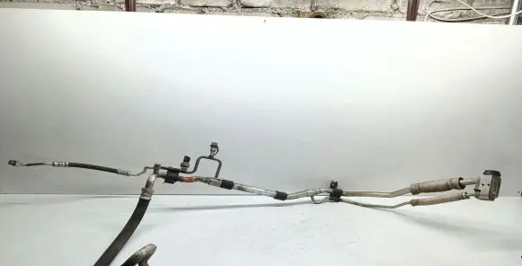 KIA Sportage Air conditioning (A/C) pipe/hose 97775F1150