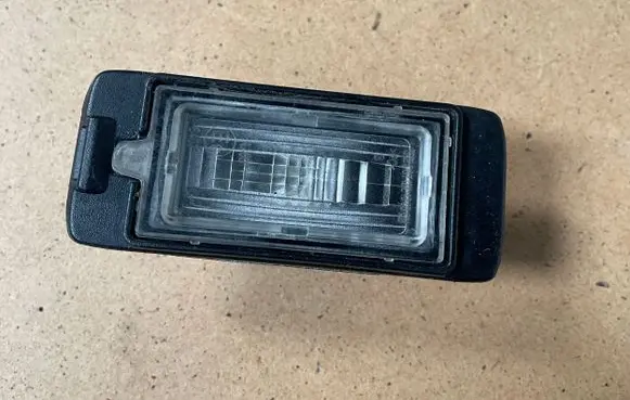 Opel Zafira C Number plate light 13578958