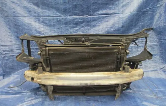 Radiator support slam panel