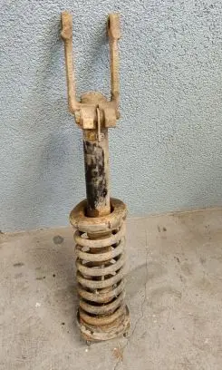Front shock absorber with coil spring