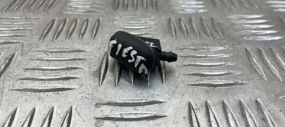 Windshield washer spray nozzle
