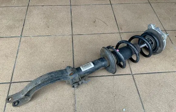 Front shock absorber with coil spring