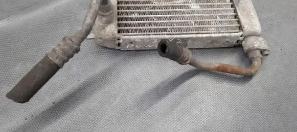 Fiat Punto (199) Engine oil radiator 7738827