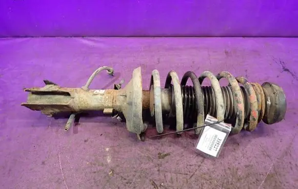 Volkswagen Golf III Front shock absorber with coil spring
