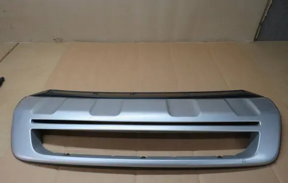 Renault Koleos I Front bumper lip 7711423553