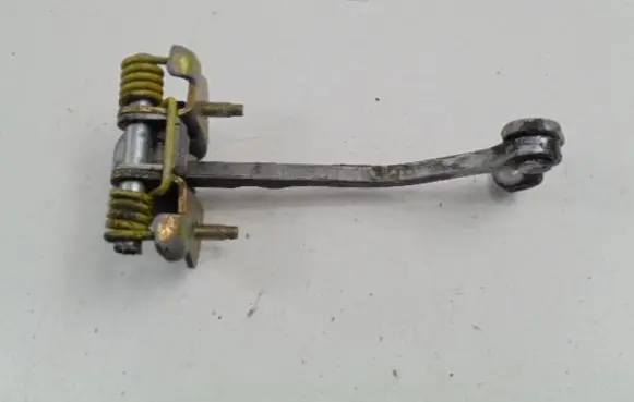 Renault Thalia I Rear door check strap stopper