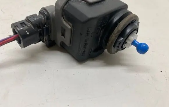 Nissan Qashqai Headlight level adjustment motor 26056AU300
