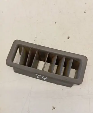Dash center air vent grill