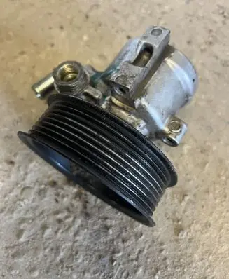 Jeep Grand Cherokee (WJ) Power steering pump 52088582AC 26069182 26051785
