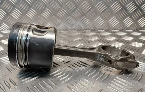 Piston with connecting rod