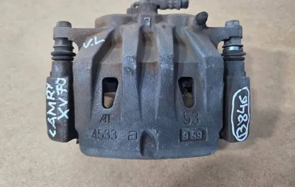 Toyota Camry VIII XV70 Front brake caliper 4533