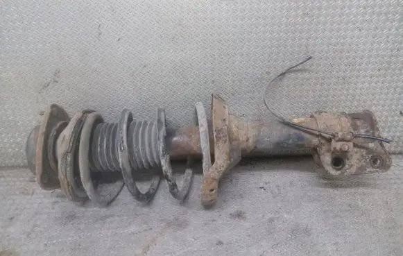 Front shock absorber with coil spring