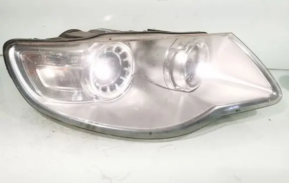 Volkswagen Touareg I Headlight/headlamp 7L6941040A