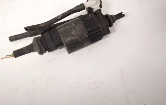 Renault Megane I Windscreen/windshield washer pump 7700821782