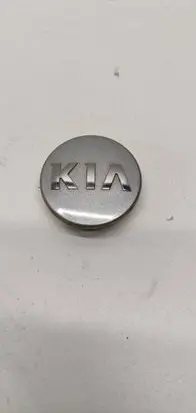 KIA Carens III Original wheel cap 529601y200