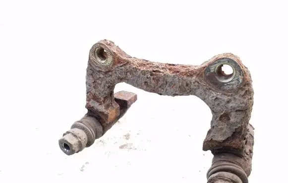 Volkswagen PASSAT B5 Brake caliper pad carrier rear 