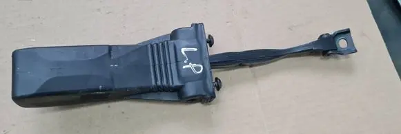 Front door check strap stopper