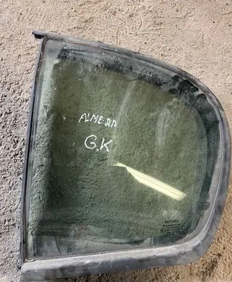Nissan Almera N16 Rear vent window glass 82273BM700