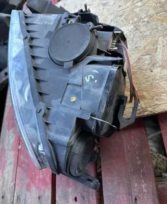 Volkswagen Touareg I Headlight/headlamp 89308471