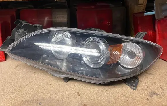 Mazda 3 I Headlight/headlamp P2690