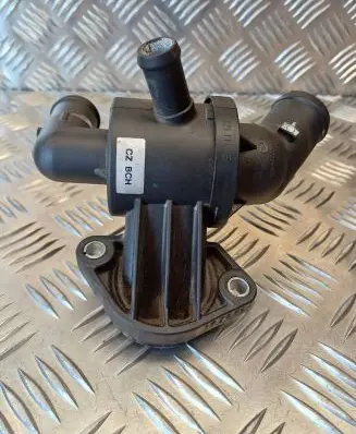 Thermostat/thermostat housing