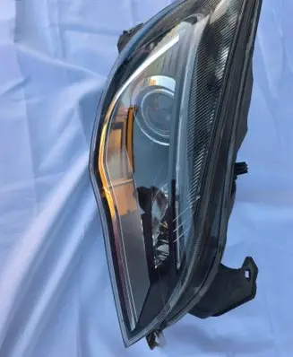 Opel Astra J Headlight/headlamp 13374518 1ZT01001206