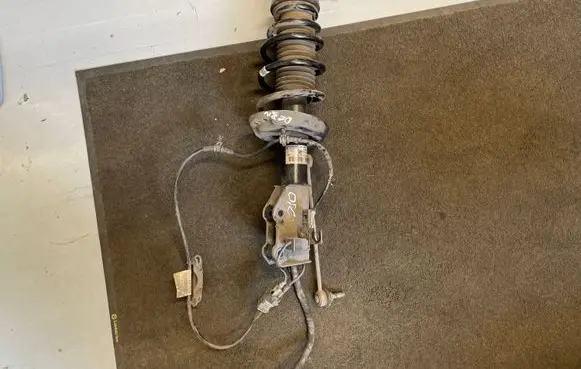 Opel Zafira C Front shock absorber/damper 13376062