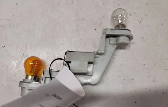 Volvo V50 Tail light bulb cover holder 28127002