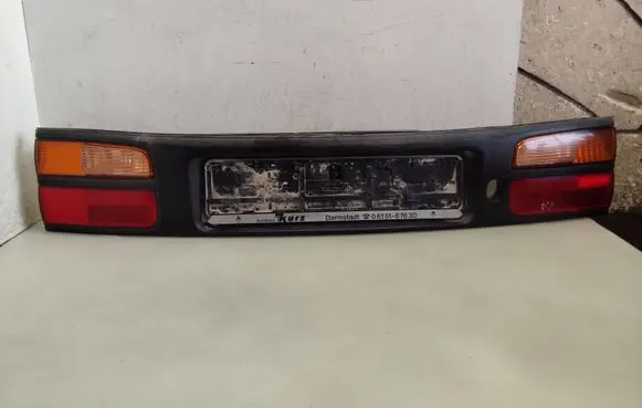 Renault Laguna I Trunk door license plate light bar 7700420119
