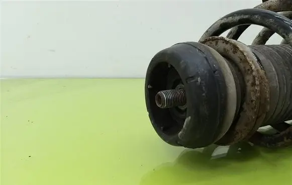 Front shock absorber with coil spring