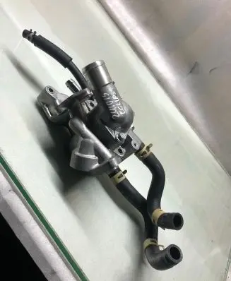 Thermostat/thermostat housing