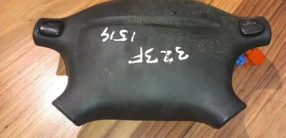 Mazda 323 Steering wheel airbag T93013A