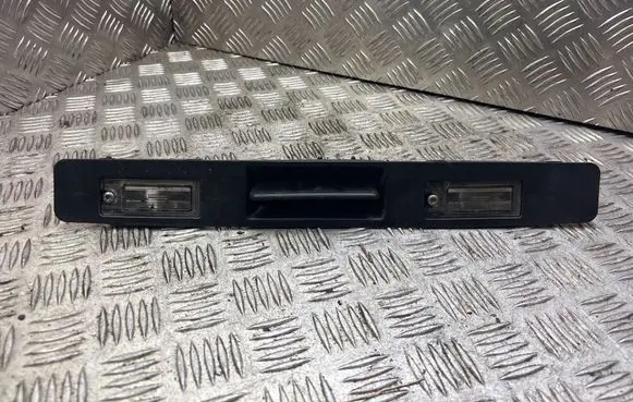 Trunk door license plate light bar