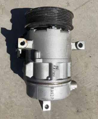 KIA Sportage Air conditioning (A/C) compressor (pump) 97701-D7450