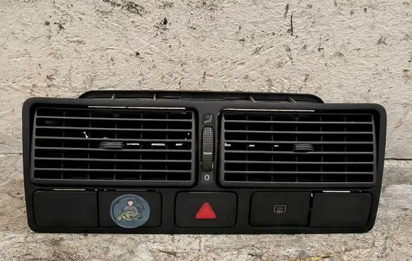 Volkswagen Golf IV Dash center air vent grill 1J0819734
